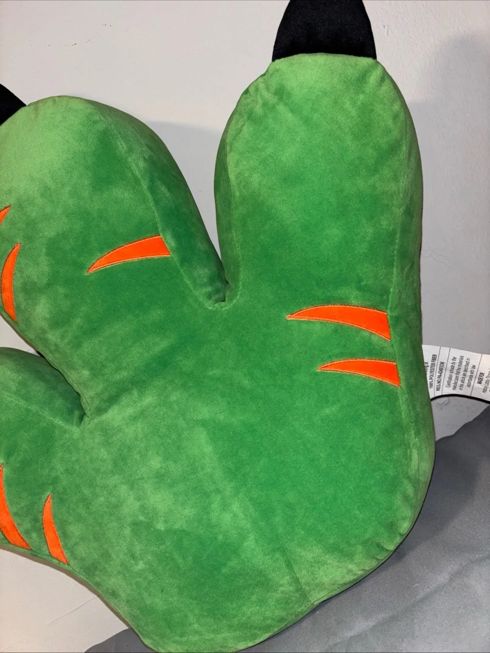 Hobby lobby green dinosaur foot throw pillow